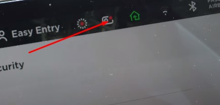 red icon on tesla car